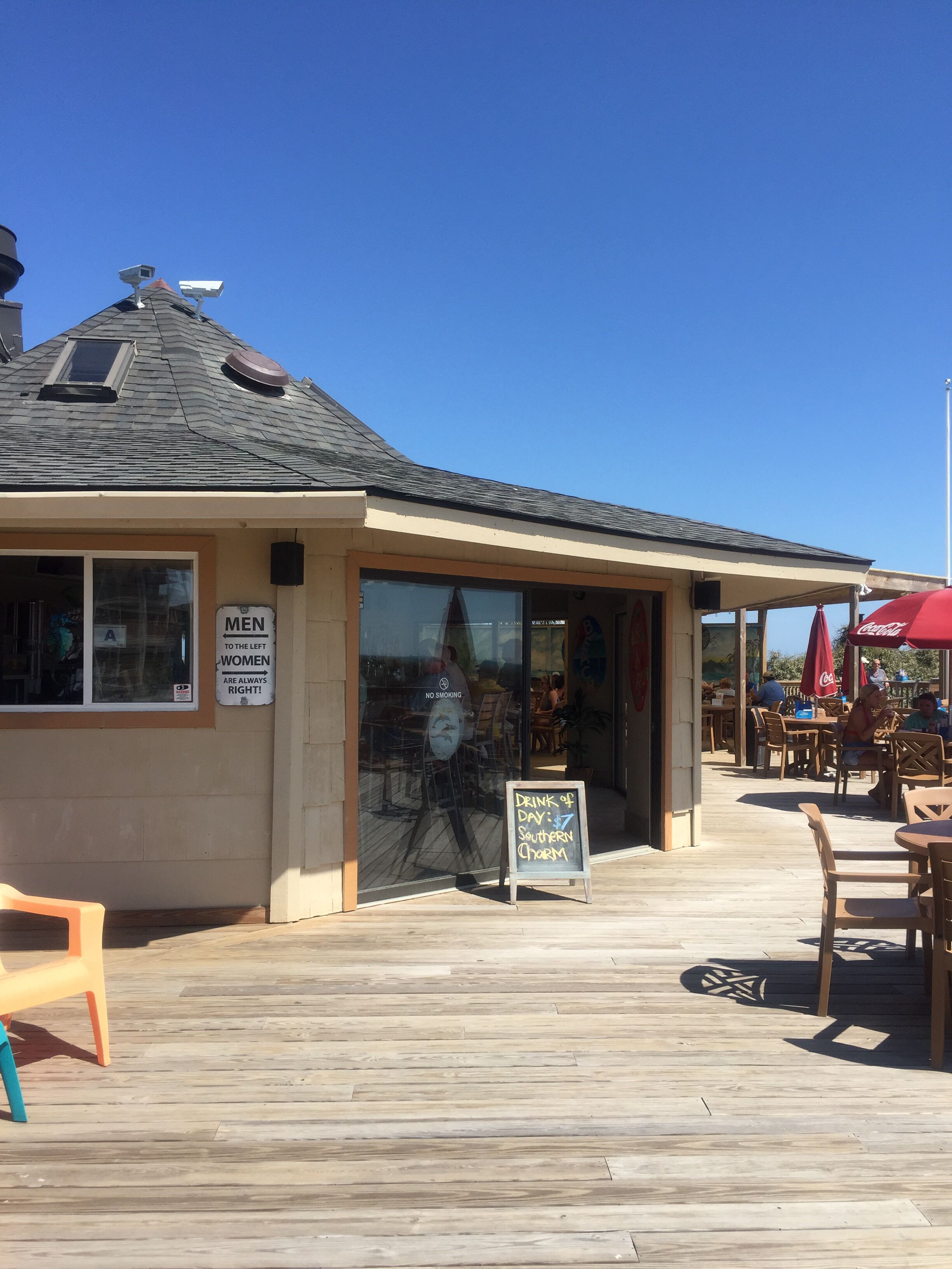 Beach bar next to the pool, grab a drink or a burger in your bathing suit! 