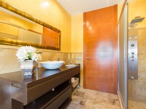 Bathtub, hair dryer, towels