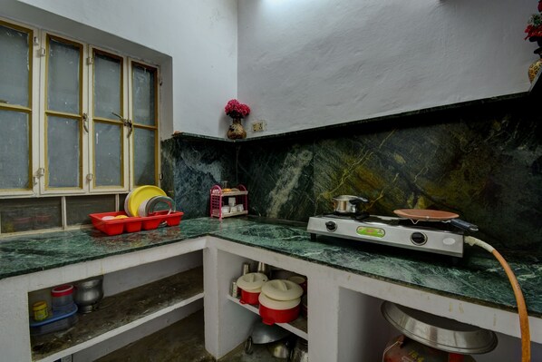 Fridge, electric kettle, toaster, cookware/dishes/utensils