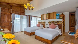 A hotel room with two wooden beds, a chandelier, and a large wooden wardrobe. - Shangri-La E-Outfitting Boutique Hotel (Deqin)