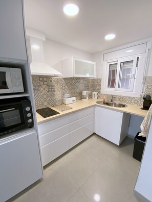 Fridge, microwave, oven, dishwasher