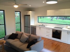 Eco Cabin # 1 | Living area | 40-inch flat-screen TV with digital channels, TV, DVD player