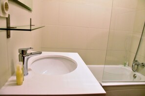 Hair dryer, towels, soap, toilet paper