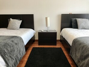 2 chambres, chambres insonorisées, fer et planche à repasser