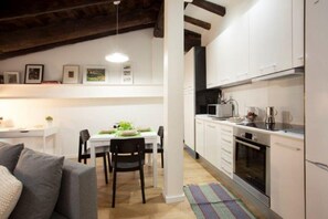 Fridge, microwave, dishwasher, coffee/tea maker