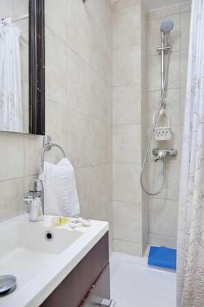 Shower, free toiletries, hair dryer, towels