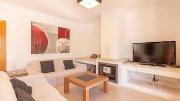 Flat-screen TV, fireplace