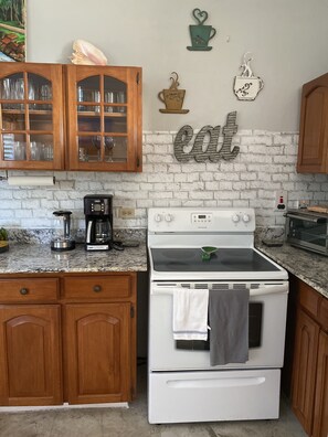 Fridge, microwave, oven, stovetop - Coastal Beauty - Beautiful Penthouse Condo (Ocho Rios)
