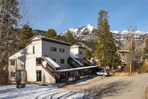 Situated in a mountainous region, this building offers a unique blend of modern architecture and natural surroundings.
