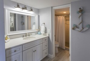Combined shower/bathtub, hair dryer, towels, soap