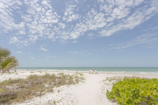 On the beach, sun loungers, beach towels