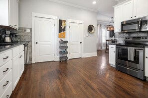 Fridge, microwave, oven, stovetop - Modern Home in Historic Strawberry Hill w/ a view of Downtown KC - Pet Friendly (Kansas City)