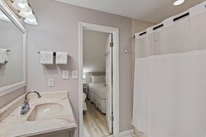 Bathtub, hair dryer, towels