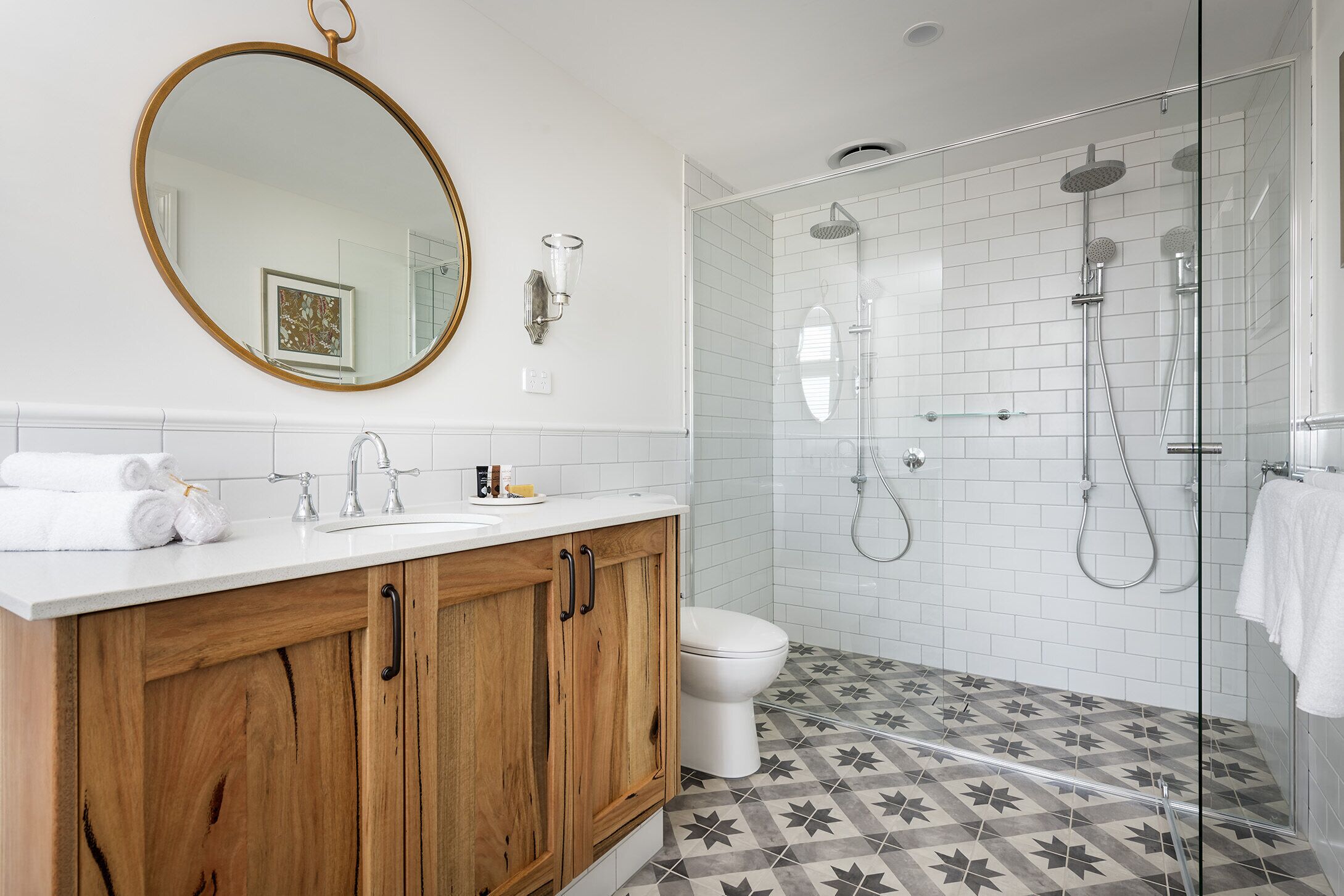 deluxe suite, 1 king bed | bathroom | free toiletries, hair dryer, bathrobes, towels