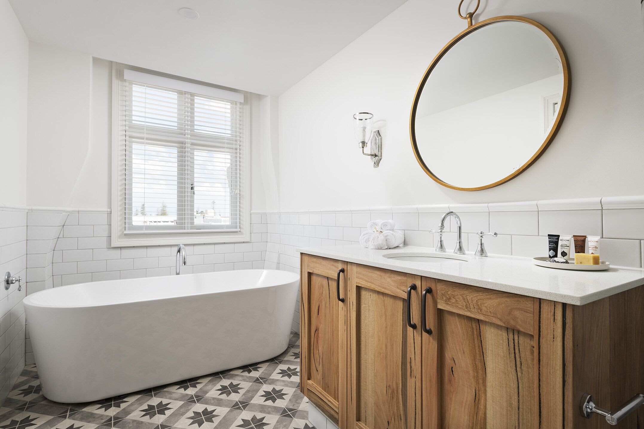 deluxe suite, 1 king bed | bathroom | free toiletries, hair dryer, bathrobes, towels