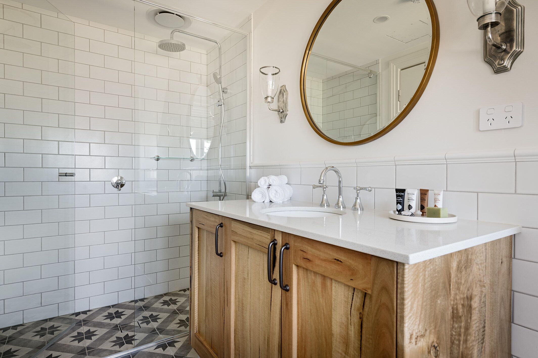 deluxe queen room | bathroom | free toiletries, hair dryer, bathrobes, towels