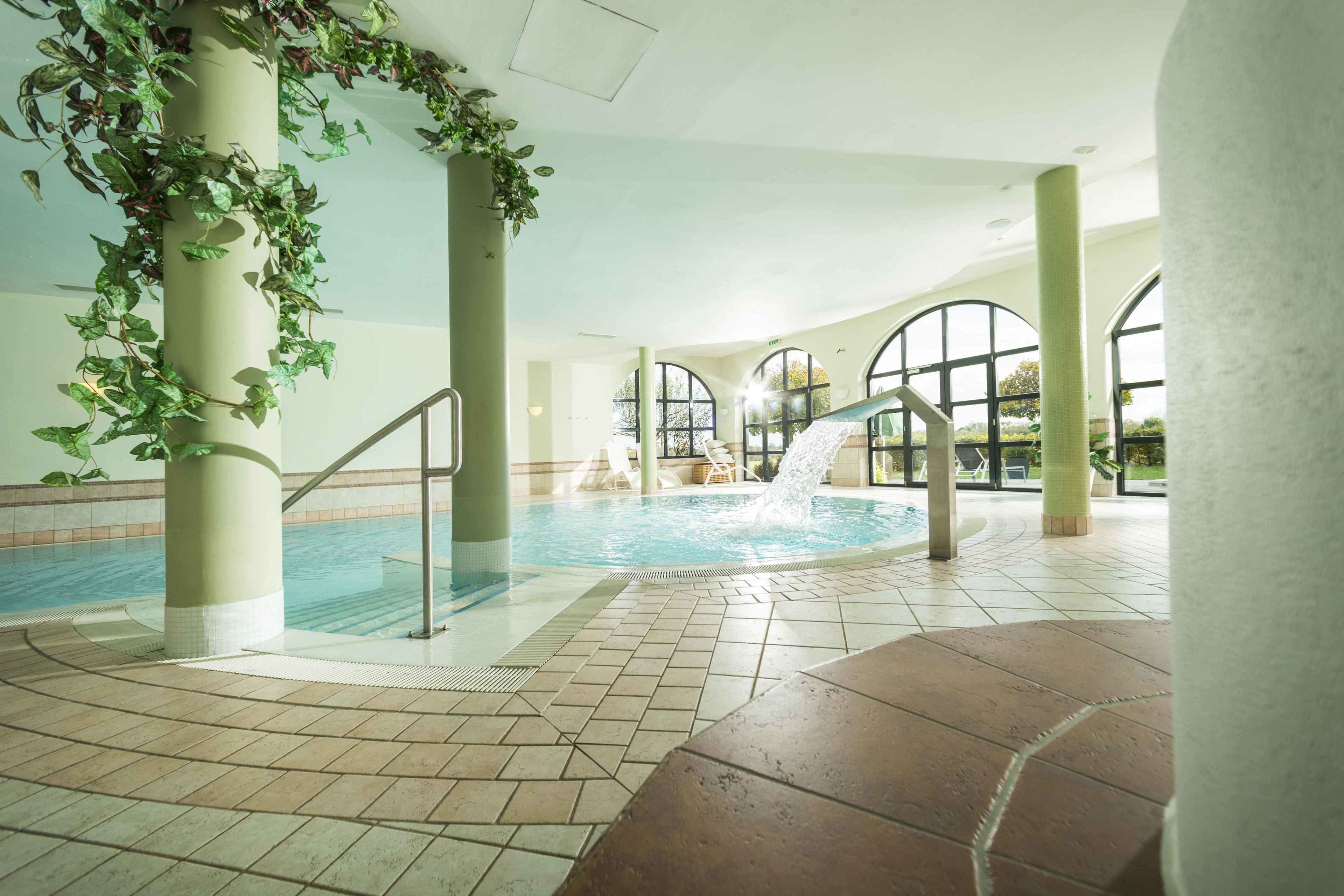 indoor pool, open 7:00 am to 9:00 pm, pool loungers