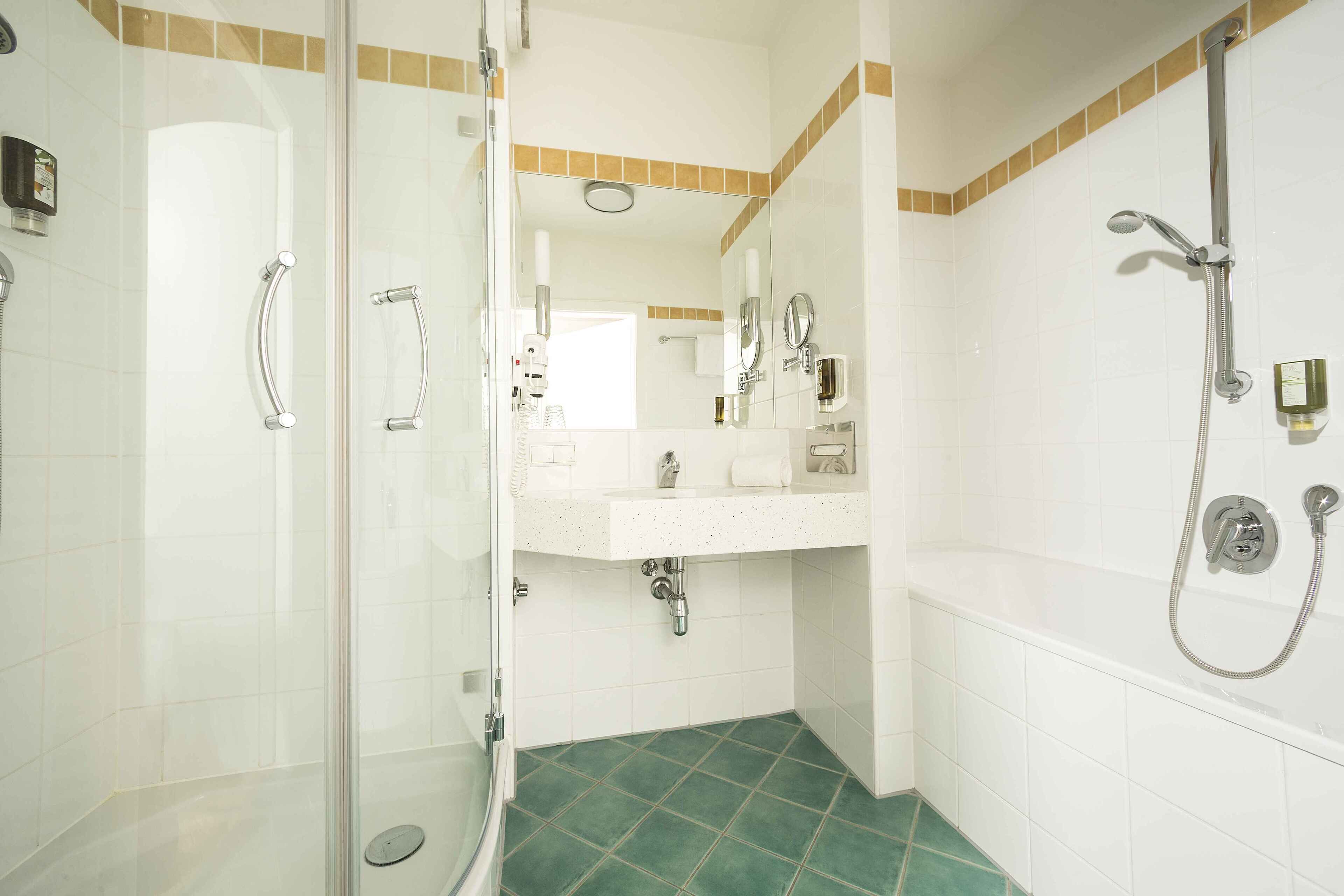 classic double room | bathroom | shower, free toiletries, hair dryer, bathrobes