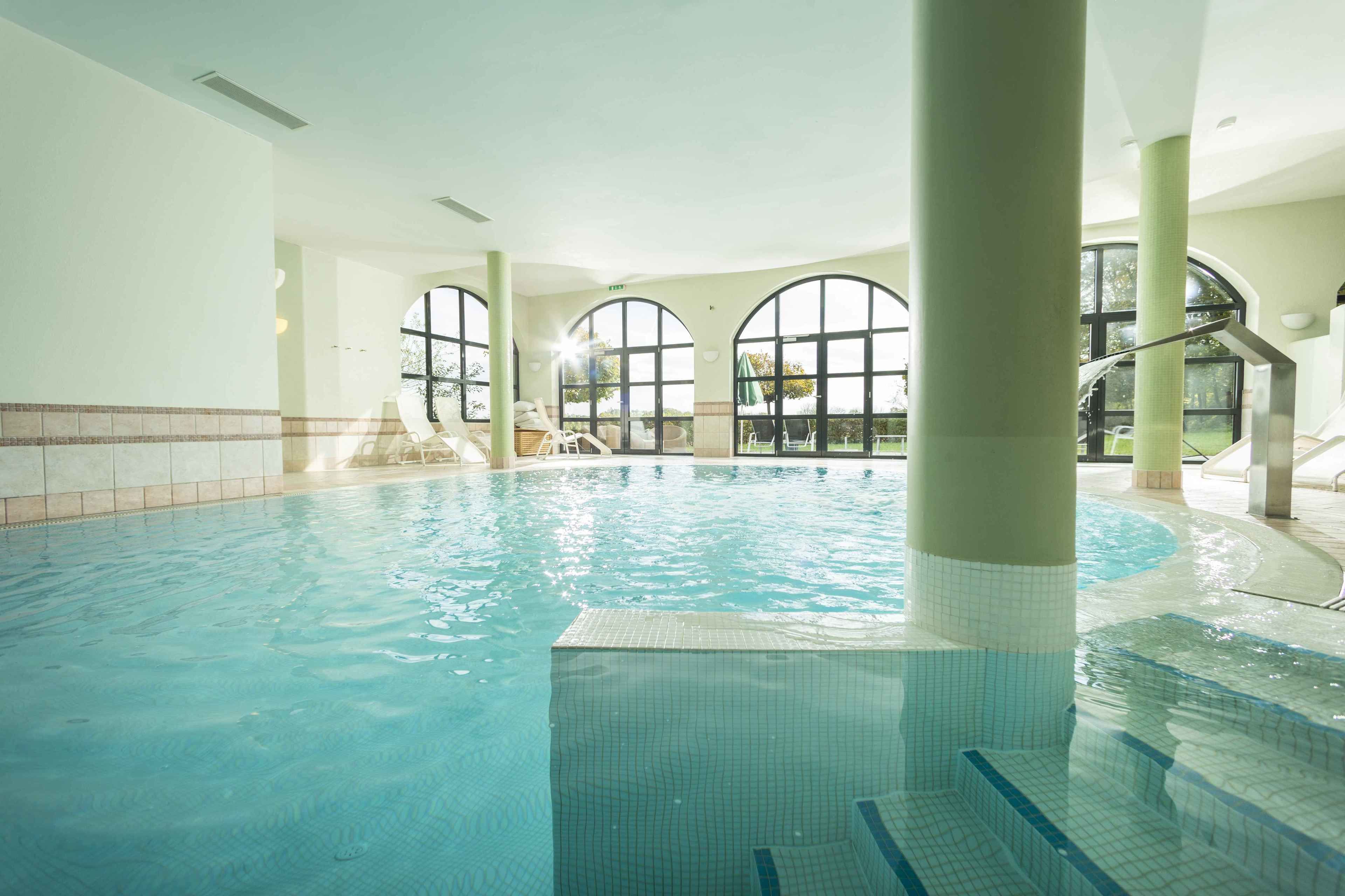 indoor pool, open 7:00 am to 9:00 pm, pool loungers