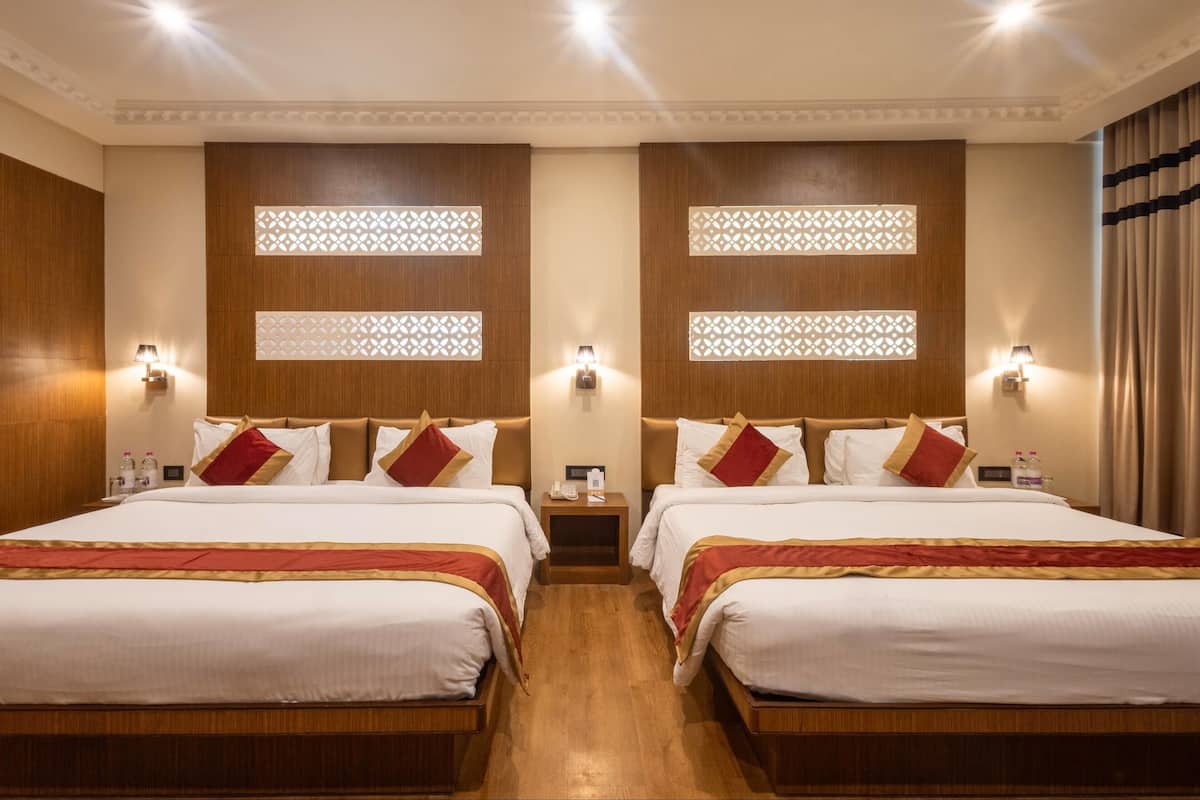 Family King Room | Minibar, in-room safe, desk, soundproofing