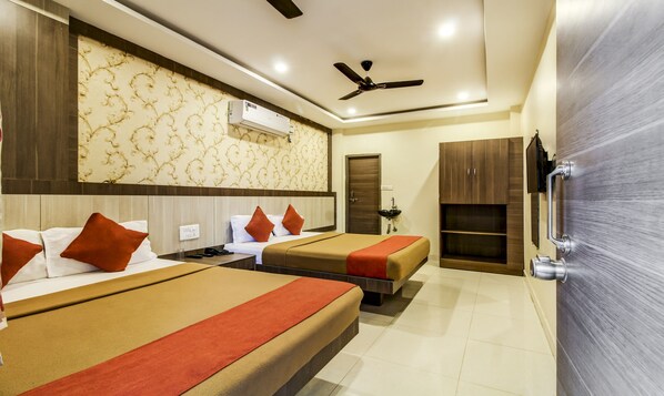 Deluxe Quadruple Room, Multiple Beds | 1 bedroom, desk, rollaway beds, free WiFi - Hotel Neem Tree (Hyderabad)