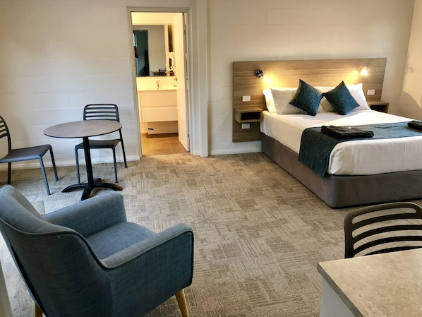 Executive Double Room, 1 Queen Bed | Living area | 42-inch LCD TV with digital channels, TV