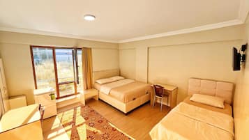Standard Twin Room, 3 Bedrooms | Desk, laptop workspace, blackout curtains, bed sheets