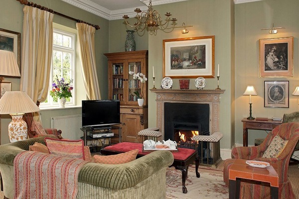 Cottage | Area soggiorno | TV a schermo piatto, lettore DVD, docking station per iPod