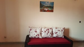 Appartement Standard, 2 chambres, non-fumeurs, cuisine | Coin séjour | Télévisions à écran plasma