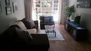Comfort Apartment, 2 Bedrooms | Living room - Woodmead Apartments (Sandton)