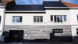 A modern building with a sign reading "T PONTON".