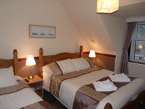 Kolmen hengen superior-huone | Vuodevaatteet