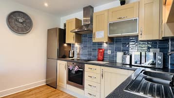 Superior-Apartment, eigenes Bad (First Floor CTR 22) | Gemeinschaftsküche