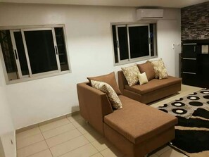 Deluxe Apartment, 2 Bedrooms | Living area - Residence Drame (Abidjan)
