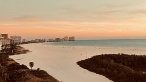 On the beach, sun loungers, beach towels