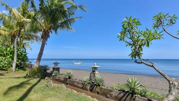 On the beach, sun loungers, beach towels