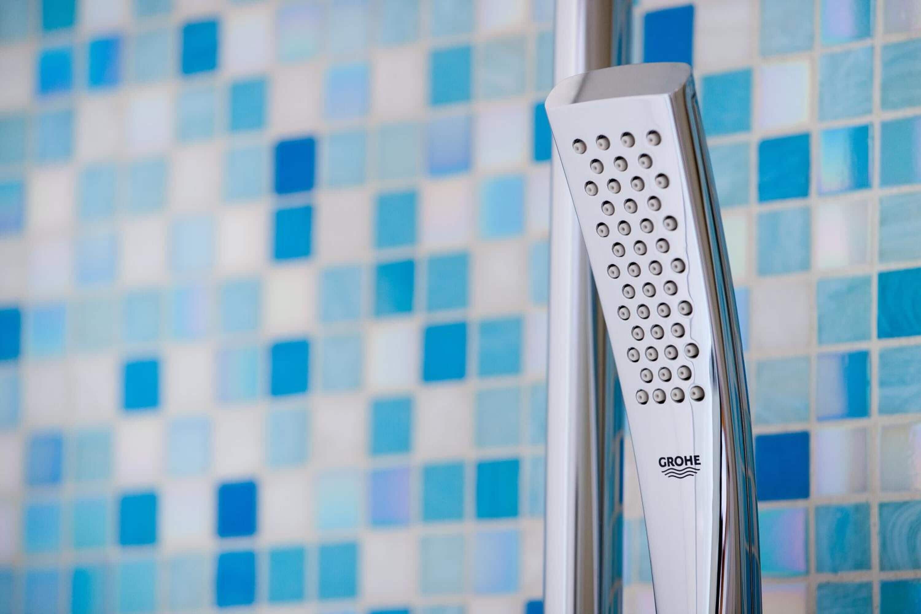 shower, rainfall showerhead, hair dryer, slippers