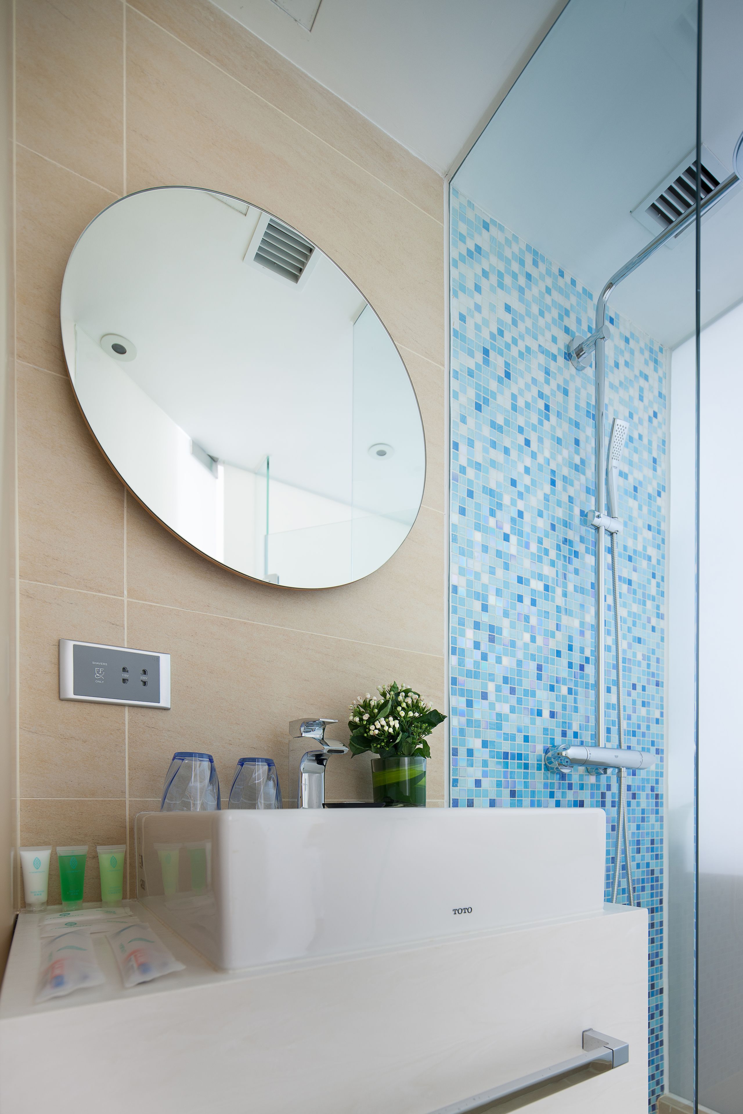 grand premier twin bed room (one registered guest must be female) | bathroom | shower, rainfall showerhead, hair dryer, slippers