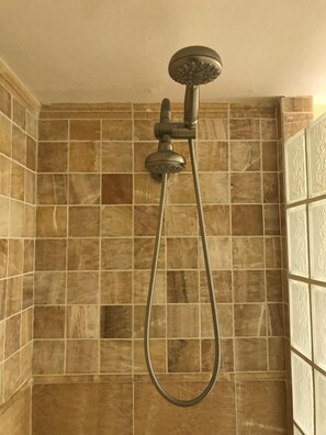 Combined shower/tub, hair dryer, towels, soap