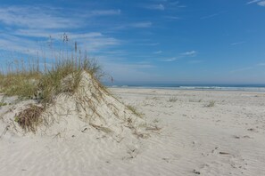 On the beach, sun-loungers, beach towels
