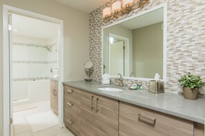 Combined shower/tub, hair dryer, towels, soap