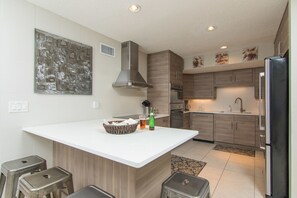 Fridge, microwave, oven, stovetop - Oceanfront - 3 Bedroom Renovated 1,800 sq ft. + Huge Balcony -  Casual Elegance (St. Augustine Beach)