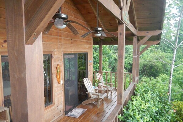 Enjoy sitting on the deck with a cool drink, beautiful Ocean and Forest views!