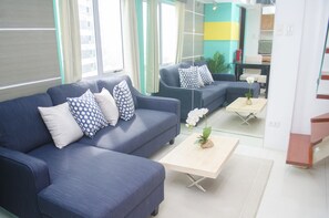 Exclusive Duplex, 2 Bedrooms, 2 Bathrooms, City View | Living area - Indigo BGC @ Fort Victoria (Taguig)