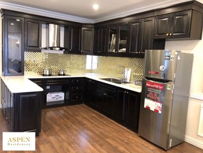 Full-size fridge, microwave, electric kettle, rice cooker