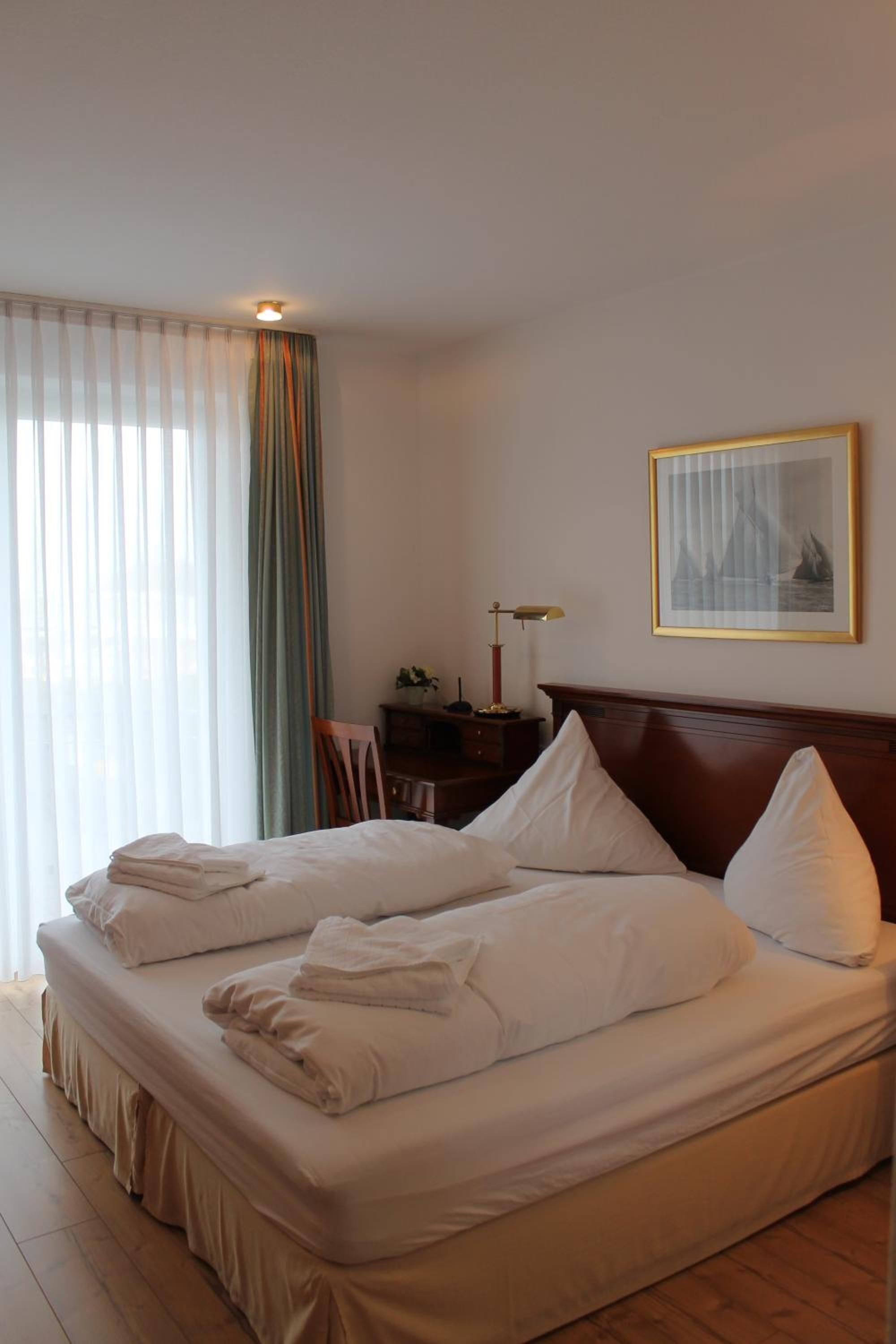 iron/ironing board, cots/infant beds, free wifi, bed sheets