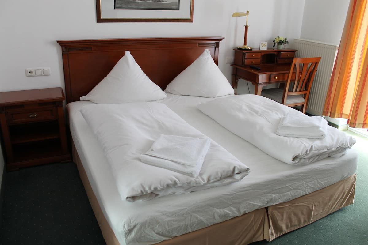 iron/ironing board, cots/infant beds, free wifi, bed sheets