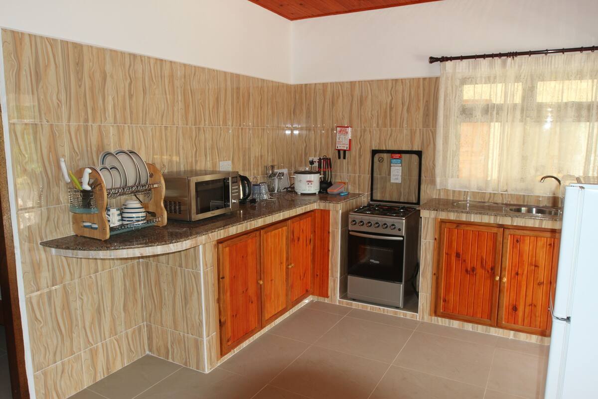 Apartamento, 2 habitaciones | Cocina privada | Frigorífico grande, microondas, horno y placa de cocina