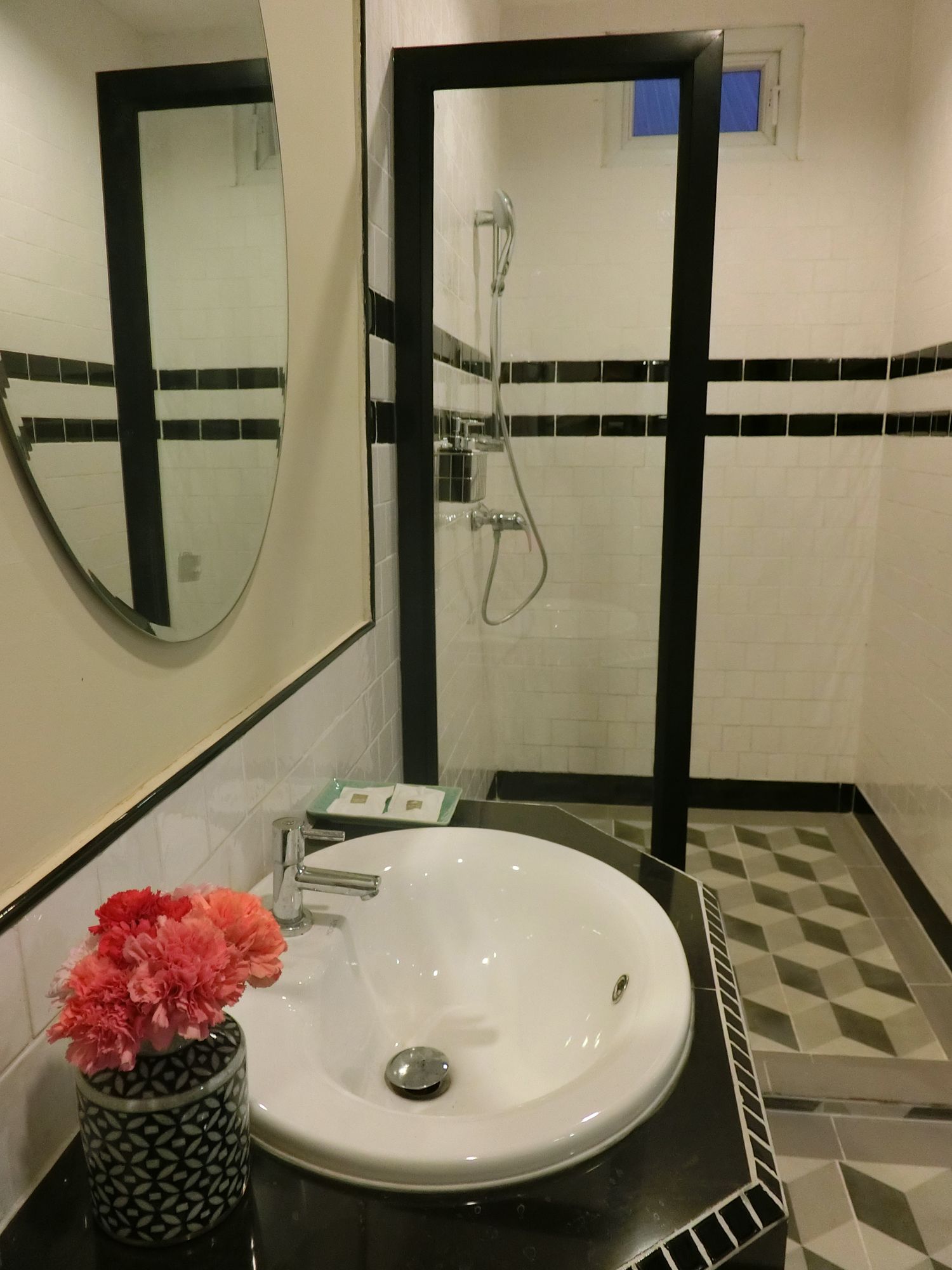 shower, free toiletries, slippers, towels