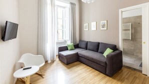 Suite – executive | Oppholdsområde | Flatskjerm-TV